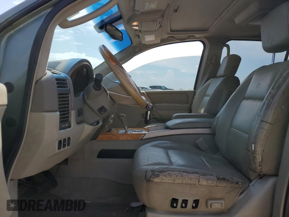2004 Infiniti QX56 with VIN 5N3AA08A44N807454, listed as a Copart auction lot 71940494 with 232,981 mi miles and Salvage Title. Bid and sale history available at carsss.com. Image 7.