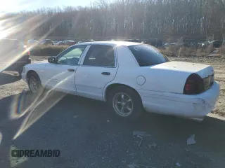 2001 Ford Crown Victoria Police Police Interceptor with VIN 2FAFP71WX1X151387, listed as a Copart auction lot 86810244 with 165,566 mi miles and Salvage Title. Bid and sale history available at carsss.com. Image 2.