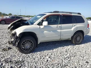 2004 Mitsubishi Endeavor XLS z VIN 4A4MN31S64E023868, wystawiony jako Copart lot #55136695 z przebiegiem 230 781 mil mil oraz Szkoda całkowita • Salvage title. Historia ofert i sprzedaży dostępna na DreamBid. Obrazek 1.