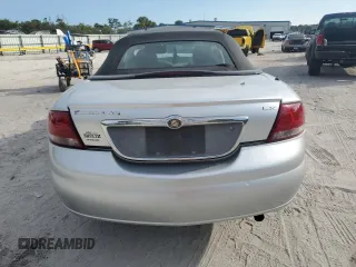 2003 Chrysler Sebring LX with VIN 1C3EL45T43N563717, listed as a Copart auction lot 44037815 with 63,059 mi miles and Salvage Title. Bid and sale history available at DreamBid. Image 6.