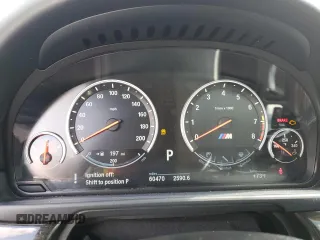 2014 BMW M5 z VIN WBSFV9C58ED097898, wystawiony jako Copart lot #86151234 z przebiegiem 60 470 mil mil oraz Tytuł czysty. Historia ofert i sprzedaży dostępna na DreamBid. Obrazek 9.