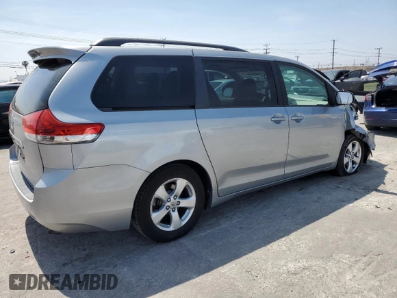 2014 Toyota Sienna LE AAS with VIN 5TDKK3DC1ES504232, listed as a Copart auction lot 54169005 with 103,724 mi miles and Salvage Title. Bid and sale history available at DreamBid. Image 3.