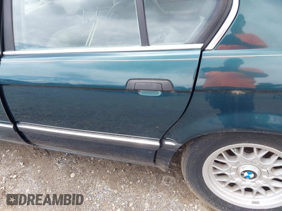 1994 BMW 7 Series with VIN WBAGD8320RDE90248, listed as a IAAI auction lot 42685094 with Not provided miles and . Bid and sale history available at DreamBid. Image 13.