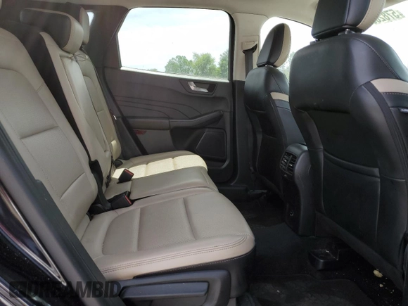 2021 Ford Escape SEL с VIN 1FMCU0H69MUA57897, выставлен на аукционе Copart как лот 57826815 с пробегом 81 263 миль миль и Списание • Salvage title. История ставок и продаж доступна на DreamBid. Изображение 11.