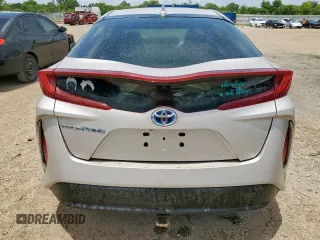 2021 Toyota Prius LE z VIN JTDKAMFP8M3177157, wystawiony jako Copart lot #63668045 z przebiegiem 44 760 mil mil oraz Czysty tytuł • Clean title. Historia ofert i sprzedaży dostępna na DreamBid. Obrazek 6.