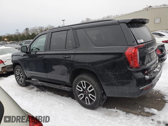 2023 GMC Yukon AT4 with VIN 1GKS2CKDXPR212872, listed as a Copart auction lot 43956265 with 74,656 mi miles and Salvage Title. Bid and sale history available at carsss.com. Image 2.
