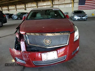 2014 Cadillac XTS Luxury z VIN 2G61M5S37E9126661, wystawiony jako Copart lot #53535315 z przebiegiem 111 469 mil mil oraz Szkody całkowita. Historia ofert i sprzedaży dostępna na DreamBid. Obrazek 5.