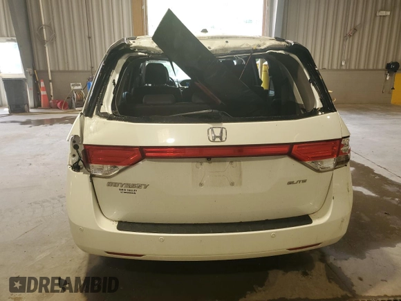 2016 Honda Odyssey Touring Elite with VIN 5FNRL5H91GB070424, listed as a Copart auction lot 55583075 with 115,709 mi miles and Salvage Title. Bid and sale history available at DreamBid. Image 6.