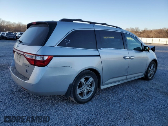 2012 Honda Odyssey Touring with VIN 5FNRL5H9XCB027758, listed as a Copart auction lot 86058504 with 164,860 mi miles and Salvage Title. Bid and sale history available at DreamBid. Image 3.