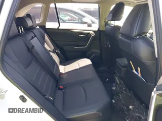 2023 Toyota RAV4 Hybrid XLE Premium with VIN JTMB6RFV0PD087237, listed as a IAAI auction lot 42606802 with 16,872 mi miles and . Bid and sale history available at DreamBid. Image 8.