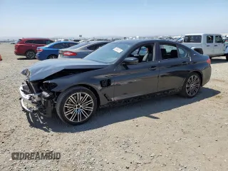 2019 BMW 5 Series 530e with VIN WBAJA9C56KB398509, listed as a Copart auction lot 53948875 with 22,670 mi miles and Salvage title. Bid and sale history available at DreamBid. Image 1.