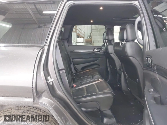 2021 Jeep Grand Cherokee 80th Anniversary z VIN 1C4RJFBG9MC580645, wystawiony jako IAAI lot #41398269 z przebiegiem 79 057 mil mil oraz . Historia ofert i sprzedaży dostępna na DreamBid. Obrazek 8.