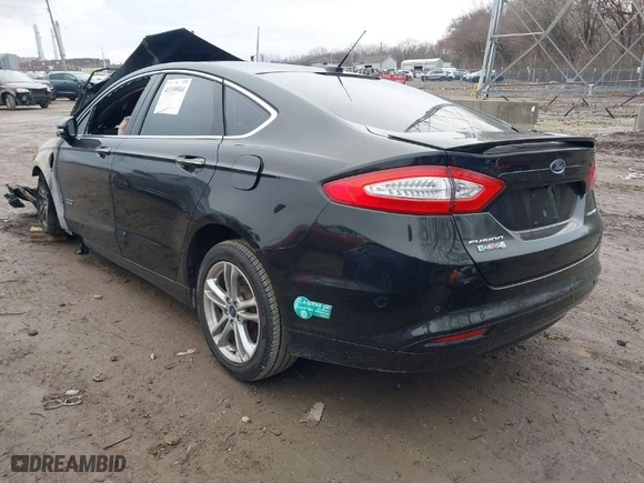 2015 Ford Fusion Energi Titanium with VIN 3FA6P0SU8FR284661, listed as a IAAI auction lot 41199944 with 1 mi miles. Bid and sale history available at carsss.com. Image 3.