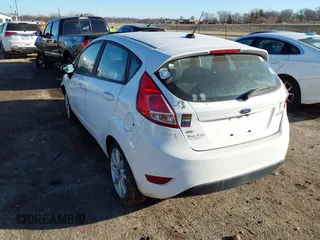 2019 Ford Fiesta SE z VIN 3FADP4EJ0KM148306, wystawiony jako IAAI lot #41666170 z przebiegiem 68 966 mil mil oraz . Historia ofert i sprzedaży dostępna na DreamBid. Obrazek 3.