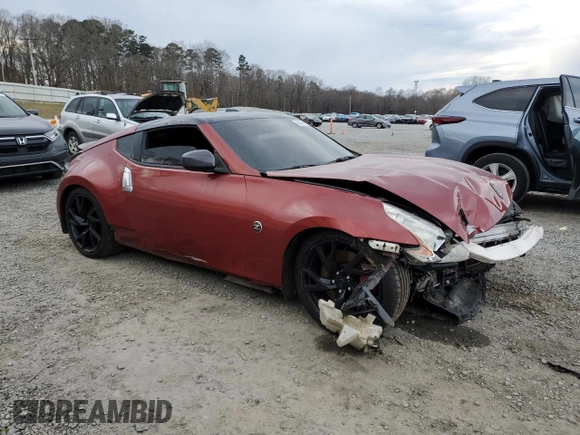 2014 Nissan 370Z Nismo with VIN JN1AZ4EH4EM631174, listed as a Copart auction lot 84396654 with Not Provided miles and Salvage Title. Bid and sale history available at DreamBid. Image 4.