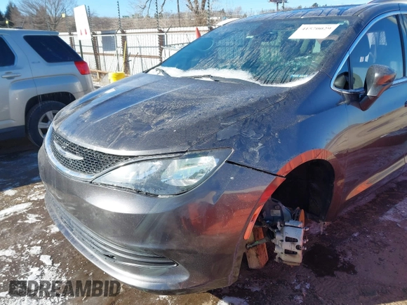 2017 Chrysler Pacifica Touring with VIN 2C4RC1DG7HR648786, listed as a IAAI auction lot 41570029 with 125,406 mi miles and . Bid and sale history available at DreamBid. Image 6.