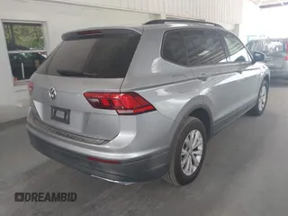 2019 Volkswagen Tiguan S with VIN 3VV1B7AX6KM189497, listed as a IAAI auction lot 42669313 with 236,719 mi miles and . Bid and sale history available at DreamBid. Image 4.