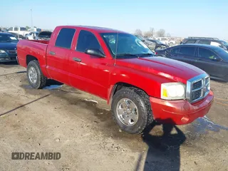 2006 Dodge Dakota SLT with VIN 1D7HE48K36S623701, listed as a IAAI auction lot 41695564 with 130,147 mi miles. Bid and sale history available at carsss.com. Image 1.