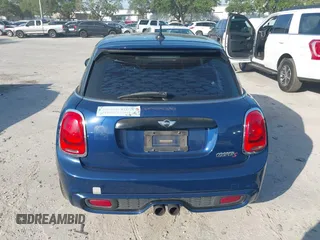 2016 MINI Cooper Hardtop 4 Door S with VIN WMWXU3C54G2D30766, listed as a IAAI auction lot 42008026 with 101,898 mi miles. Bid and sale history available at carsss.com. Image 16.