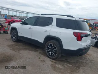 2021 GMC Acadia SLT with VIN 1GKKNMLS3MZ176996, listed as a IAAI auction lot 42475945 with 82,571 mi miles and . Bid and sale history available at DreamBid. Image 3.
