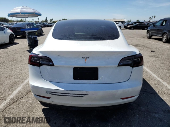 2023 Tesla Model 3 with VIN 5YJ3E1EA9PF401418, listed as a Copart auction lot 50597015 with 79,673 mi miles and Salvage Title. Bid and sale history available at DreamBid. Image 6.