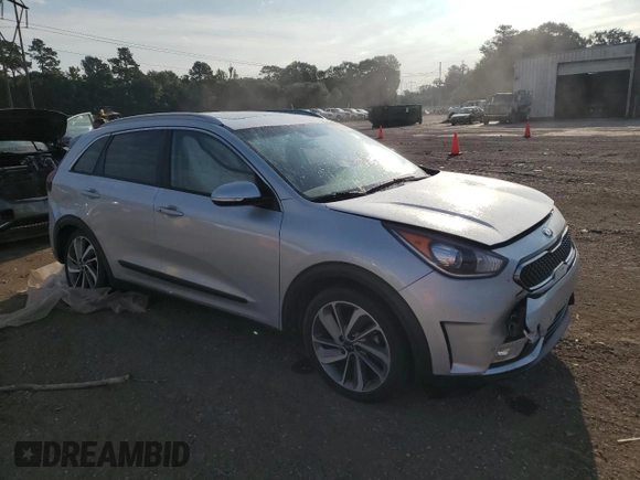 2017 Kia Niro Touring with VIN KNDCE3LCXH5066284, listed as a Copart auction lot 56571654 with 81,702 mi miles and Salvage Title. Bid and sale history available at carsss.com. Image 4.