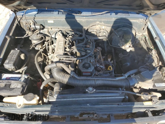 1994 Toyota Pickup z VIN 4TARN81A5RZ221208, wystawiony jako Copart lot #47466265 z przebiegiem 244 088 mil mil oraz Szkoda całkowita • Salvage title. Historia ofert i sprzedaży dostępna na DreamBid. Obrazek 11.
