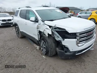 2023 GMC Acadia SLE z VIN 1GKKNKL48PZ170606, wystawiony jako IAAI lot #42020583 z przebiegiem 24 128 mil mil oraz . Historia ofert i sprzedaży dostępna na DreamBid. Obrazek 1.