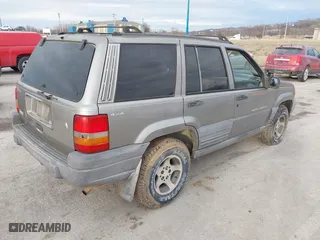 1997 Jeep Grand Cherokee Laredo with VIN 1J4GZ58S4VC745129, listed as a IAAI auction lot 41641005 with 1 mi miles. Bid and sale history available at carsss.com. Image 4.