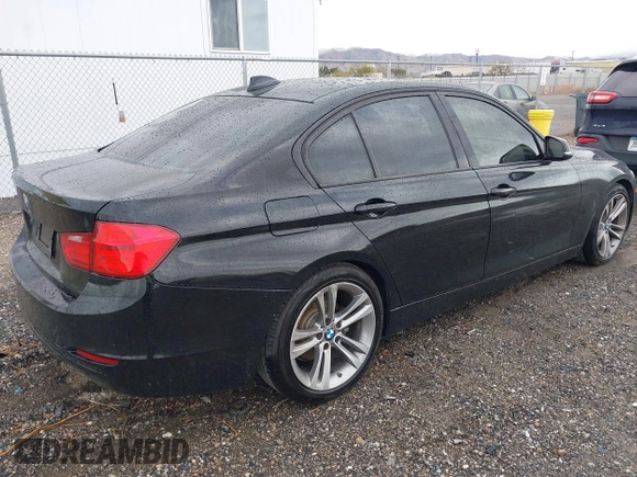 2013 BMW 3 Series 328i with VIN WBA3A5C56DF453232, listed as a IAAI auction lot 41794450 with 152,304 mi miles. Bid and sale history available at carsss.com. Image 4.