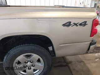 2005 Dodge Dakota Laramie with VIN 1D7HW58N15S159061, listed as a IAAI auction lot 41898306 with 114,288 mi miles and . Bid and sale history available at DreamBid. Image 6.