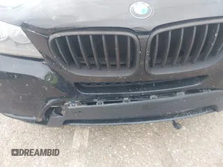 2014 BMW X3 xDrive28i with VIN 5UXWX9C59E0D19312, listed as a IAAI auction lot 41897578 with 142,244 mi miles and . Bid and sale history available at DreamBid. Image 6.
