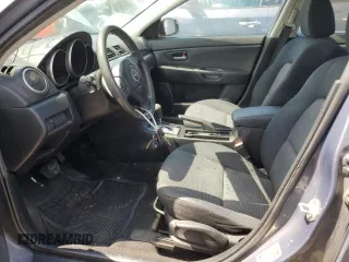 2007 Mazda 3 i Touring with VIN JM1BK12F771613103, listed as a Copart auction lot 52523994 with 259,387 mi miles and Salvage Title. Bid and sale history available at DreamBid. Image 7.