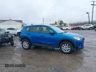 2014 Mazda CX-5 Sport with VIN JM3KE4BE6E0336504, listed as a IAAI auction lot 41961244 with 125,150 mi miles. Bid and sale history available at carsss.com. Image 14.