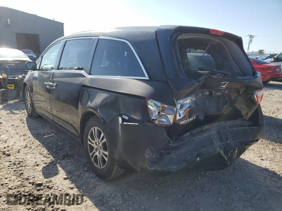 2012 Honda Odyssey EX-L with VIN 5FNRL5H69CB141594, listed as a Copart auction lot 55422115 with 181,745 mi miles and Salvage Title. Bid and sale history available at DreamBid. Image 2.