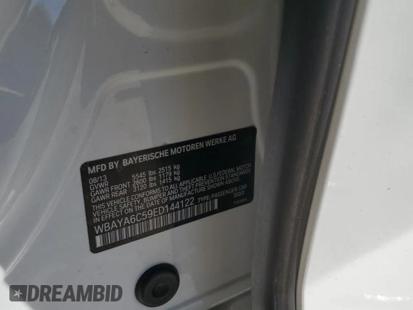 2014 BMW 7 Series 740i with VIN WBAYA6C59ED144122, listed as a Copart auction lot 75059334 with 78,090 mi miles and Salvage Title. Bid and sale history available at carsss.com. Image 12.