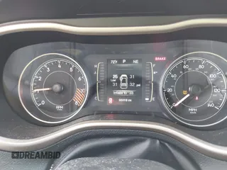2014 Jeep Cherokee Latitude with VIN 1C4PJMCS0EW169696, listed as a IAAI auction lot 41647691 with 98,919 mi miles. Bid and sale history available at carsss.com. Image 7.