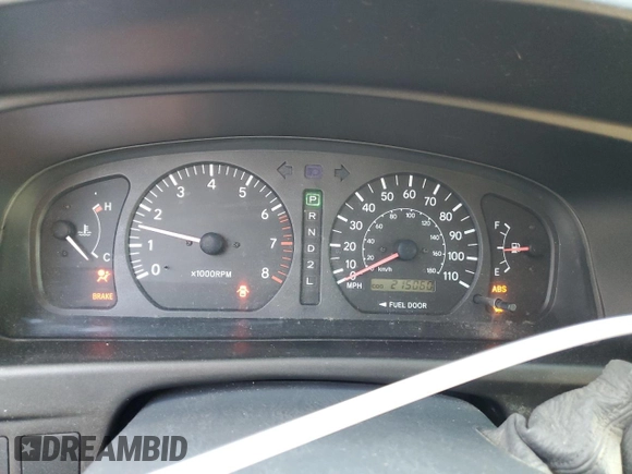 1999 Toyota Sienna LE with VIN 4T3ZF13C8XU108650, listed as a Copart auction lot 74476004 with 215,060 mi miles and Salvage Title. Bid and sale history available at carsss.com. Image 9.