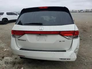 2014 Honda Odyssey Touring z VIN 5FNRL5H91EB089813, wystawiony jako Copart lot #58674275 z przebiegiem Nie podano mil oraz Szkoda całkowita • Salvage title. Historia ofert i sprzedaży dostępna na DreamBid. Obrazek 6.