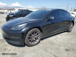 2021 Tesla Model 3 Standard Range Plus with VIN 5YJ3E1EAXMF069467, listed as a Copart auction lot 63273134 with 66,393 mi miles and Salvage Title. Bid and sale history available at carsss.com. Image 1.