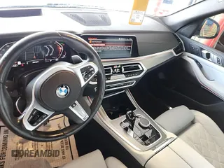 2023 BMW X5 xDrive40i with VIN 5UXCR6C00P9R65110, listed as a IAAI auction lot 42635441 with 32,227 mi miles and . Bid and sale history available at DreamBid. Image 2.