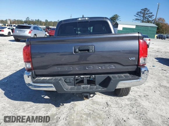 2020 Toyota Tacoma SR5 with VIN 3TMAZ5CN8LM134884, listed as a Copart auction lot 81489954 with 76,102 mi miles and Salvage title. Bid and sale history available at DreamBid. Image 6.