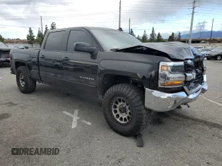 2017 Chevrolet Silverado 1500 LT with VIN 1GCPCREC5HF180243, listed as a Copart auction lot 87308314 with 139,964 mi miles and Salvage Title. Bid and sale history available at DreamBid. Image 4.