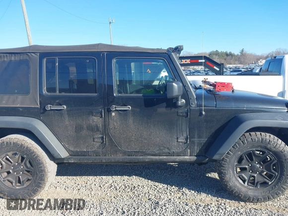 2016 Jeep Wrangler Unlimited Sport with VIN 1C4BJWDG0GL123581, listed as a IAAI auction lot 41426577 with 102,301 mi miles and . Bid and sale history available at DreamBid. Image 13.
