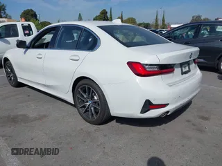 2019 BMW 3 Series 330i with VIN WBA5R1C55KAK12332, listed as a IAAI auction lot 41692035 with 13,657 mi miles and . Bid and sale history available at DreamBid. Image 3.