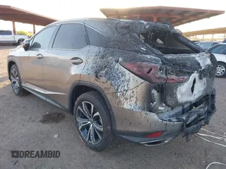 2022 Lexus RX with VIN 2T2HZMDA9NC332661, listed as a IAAI auction lot 41877725 with 19,045 mi miles. Bid and sale history available at carsss.com. Image 3.