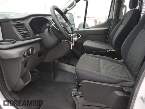 2024 Ford Transit Cargo with VIN 1FTBR1Y88RKA33408, listed as a Copart auction lot 75762044 with Not Provided miles and Clean Title. Bid and sale history available at DreamBid. Image 7.
