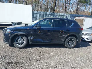 2017 Mazda CX-5 Touring with VIN JM3KFBCL5H0193919, listed as a IAAI auction lot 41751832 with 62,694 mi miles. Bid and sale history available at carsss.com. Image 14.