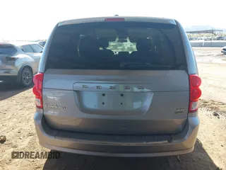 2015 Dodge Grand Caravan SXT with VIN 2C4RDGCG1FR649074, listed as a IAAI auction lot 41759409 with 116,856 mi miles and . Bid and sale history available at DreamBid. Image 17.