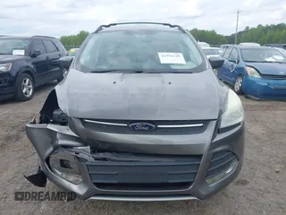 2013 Ford Escape SE with VIN 1FMCU9GX4DUC98328, listed as a IAAI auction lot 41956249 with 114,195 mi miles and . Bid and sale history available at DreamBid. Image 11.
